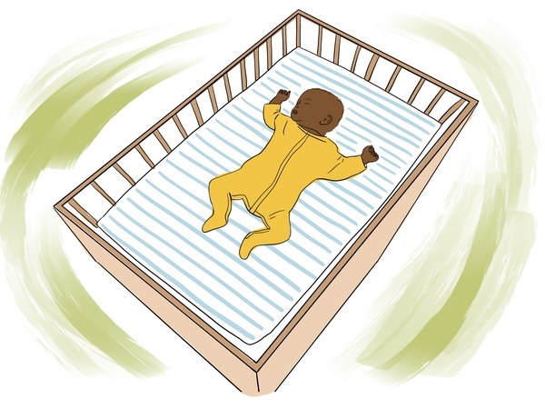 Baby sleeping in a cot