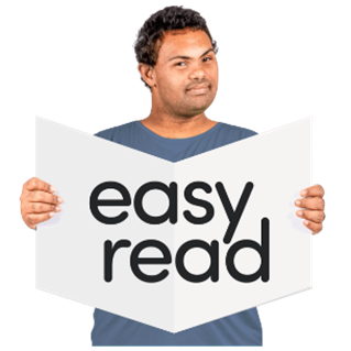 Man with book that says "Easy Read"